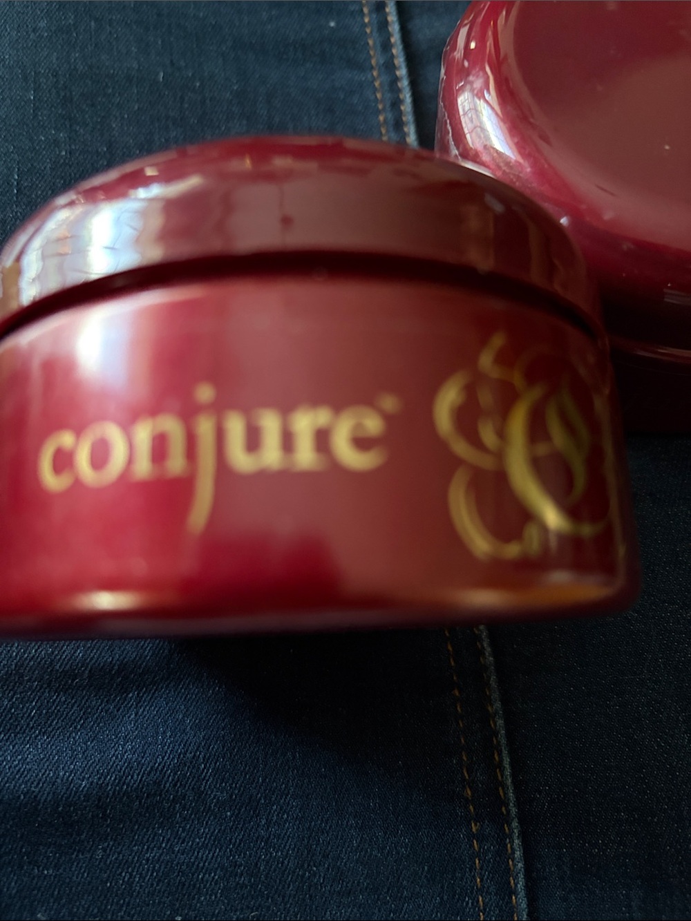 Conjure Hair Mask Jar in Deep Red with Gold Logo.